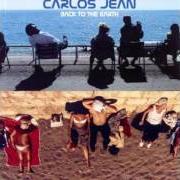 Le texte musical FREE de CARLOS JEAN est également présent dans l'album Back to the earth (2002)