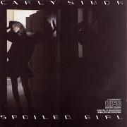 Le texte musical COME BACK HOME de CARLY SIMON est également présent dans l'album Spoiled girl (1985)