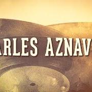 Le texte musical LE MONDE EST SOUS NOS PAS de CHARLES AZNAVOUR est également présent dans l'album 65 (1965)