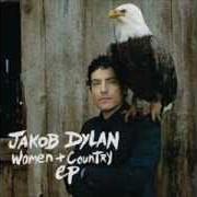 Le texte musical LEND A HAND de JAKOB DYLAN est également présent dans l'album Women and country (2010)