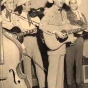 Le texte musical WARM RED WINE de ERNEST TUBB est également présent dans l'album Country music legends