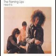 Le texte musical MAN FROM PAKISTAN de THE FLAMING LIPS est également présent dans l'album Hear it is (1986)