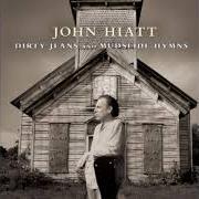 Le texte musical LOVE IN FLAMES de JOHN HIATT est également présent dans l'album The best of john hiatt (1998)