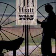 Le texte musical MILE HIGH de JOHN HIATT est également présent dans l'album Walk on (1995)