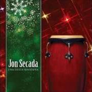 Le texte musical QUIERO CANTAR de JON SECADA est également présent dans l'album Una fiesta navidena (2007)