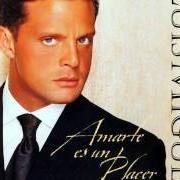 Le texte musical DÍMELO EN UN BESO de LUIS MIGUEL est également présent dans l'album Amarte es un placer (1999)