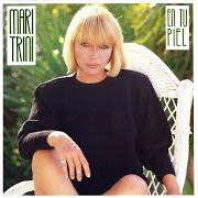 Le texte musical TE JURÉ de MARI TRINI est également présent dans l'album En tu piel (1987)