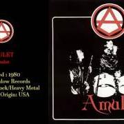 Le texte musical BLACK CANDLE de AMULET est également présent dans l'album The first (2014)