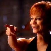 Le texte musical UP AND FLYING de REBA MCENTIRE est également présent dans l'album If you see him (1999)