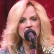 Le texte musical WHAT A WOMAN WANTS TO HEAR de RHONDA VINCENT est également présent dans l'album Destination life (2009)