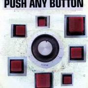 Le texte musical PUSH ANY BUTTON de SAM PHILLIPS est également présent dans l'album Push any button (2013)