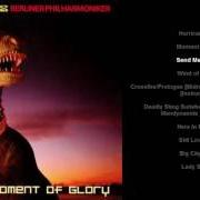 Le texte musical WIND OF CHANGE de SCORPIONS est également présent dans l'album Moment of glory (2000)