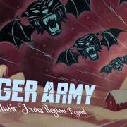 Le texte musical AS THE COLD RAIN FALLS de TIGER ARMY est également présent dans l'album Music from regions beyond (2007)