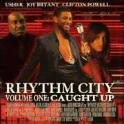 Le texte musical DOT COM de USHER est également présent dans l'album Rhythm city vol. 1 - caught up (bonus cd) (2005)
