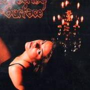 Le texte musical ... AND SHE BLOSSOMED de WITHERING SURFACE est également présent dans l'album Scarlet silhouettes (1997)