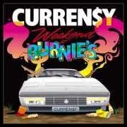 Le texte musical SHE DON'T WANT A MAN de CURRENSY est également présent dans l'album Weekend at burnie's