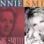 Le texte musical BORN A WOMAN de CONNIE SMITH est également présent dans l'album Downtown country (1967)