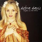 Le texte musical MOON UPON MY SHOULDER de DEBRA DAVIS est également présent dans l'album Angels in the attic (1999)
