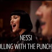 Le texte musical ROLLING WITH THE PUNCHES de NESSI est également présent dans l'album Rolling with the punches (2015)