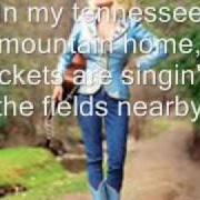 Le texte musical DADDY'S WORKING BOOTS de DOLLY PARTON est également présent dans l'album My tennessee mountain home (1973)