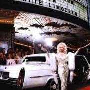 Le texte musical WHY'D YOU COME IN HERE LOOKIN LIKE THAT de DOLLY PARTON est également présent dans l'album White limozeen (1989)