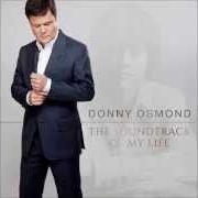 Le texte musical DON'T GIVE UP de DONNY OSMOND est également présent dans l'album The soundtrack of my life (2014)