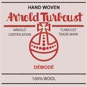 Le texte musical A L'EST EST L'OUEST de ARNOLD TURBOUST est également présent dans l'album Démodé (2010)