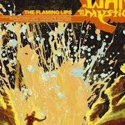 Le texte musical FREE RADICALS de THE FLAMING LIPS est également présent dans l'album At war with the mystics (2006)