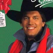 Le texte musical AWAY IN A MANGER de GEORGE STRAIT est également présent dans l'album Merry christmas strait to you (1986)