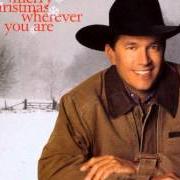 Le texte musical THE CHRISTMAS SONG de GEORGE STRAIT est également présent dans l'album Merry christmas wherever you are (1999)