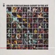 Le texte musical SHININ' ON de GRAND FUNK RAILROAD est également présent dans l'album Caught in the act (1975)