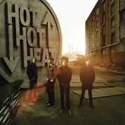 Le texte musical GIVE UP? de HOT HOT HEAT est également présent dans l'album Happiness ltd. (2007)