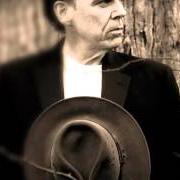 Le texte musical THE NAGGING DARK de JOHN HIATT est également présent dans l'album Beneath this gruff exterior (2003)