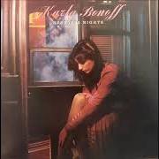 Le texte musical TROUBLE AGAIN de KARLA BONOFF est également présent dans l'album Restless nights (1989)