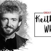 Le texte musical BETWEEN AN OLD MEMORY AND ME de KEITH WHITLEY est également présent dans l'album The lovin' side